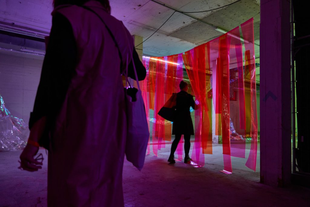 people entering the last phase, oasis, colourful curtain, multi sensory experience